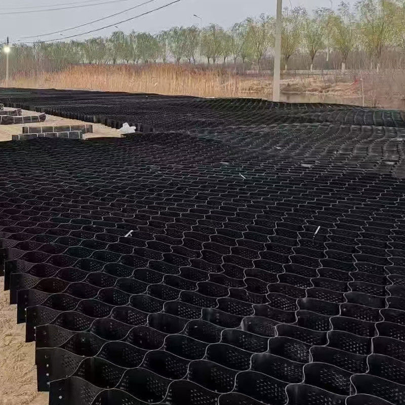 सड़क निर्माण स्थिरीकरण के लिए बनावटदार और छिद्रित प्लास्टिक हनीकॉम्ब एचडीपीई जियोसेल बजरी ग्रिड